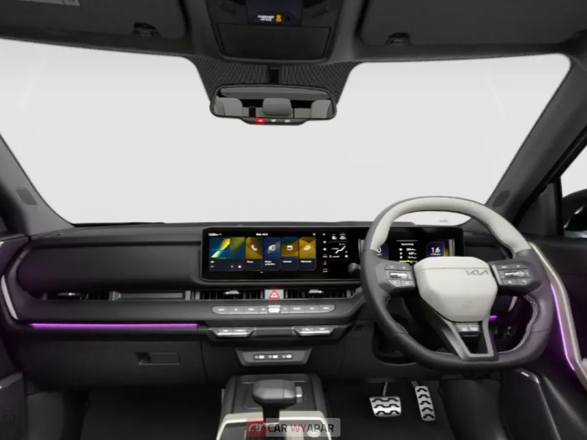 Interior dashboard view of a Seltos GTX featuring ambient lighting and a high-tech steering wheel.